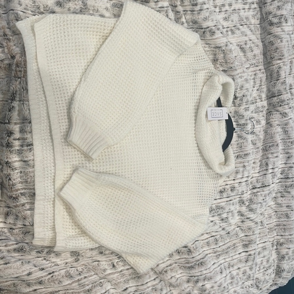New sweater with tags! Never worn.